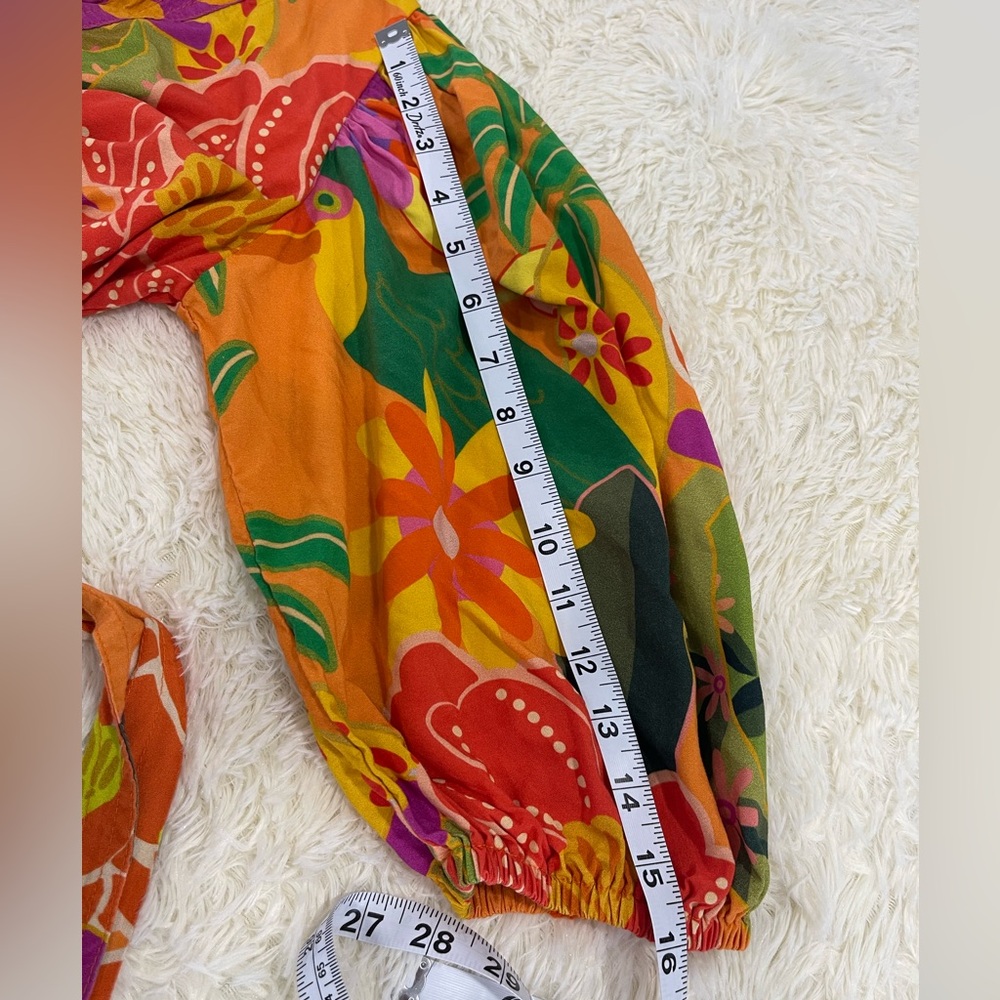 Vibrant Patchwork Blouse With Floral Accents - image 6